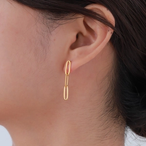 Minimalist gold stainless steel paperclip chain earrings on model for daily wear