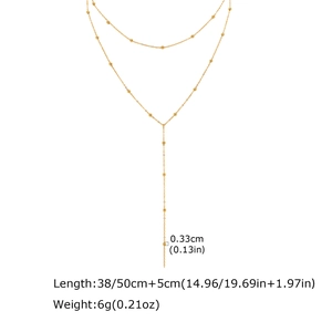 Détail du collier en Y double couche doré avec perles de 0,33cm et spécifications de taille