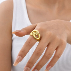 Intertwined gold-tone double band ring for women in a modern minimalist style