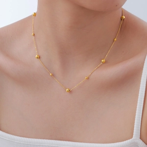 Collier élégant en acier inoxydable doré avec perles minimalistes pour femmes