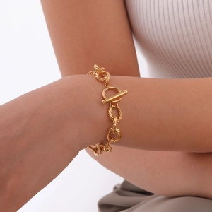 Golden stainless steel twisted link bracelet with OT toggle clasp for women