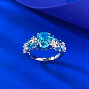 Macro shot of S925 silver ring featuring blue hydrangea flower and 2 carat zircon