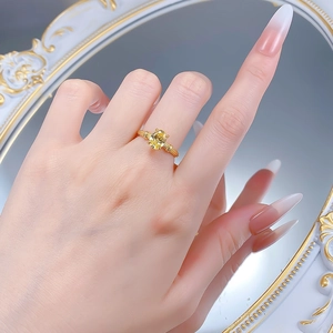 Elegant 18k gold plated S925 silver ring featuring an oval yellow gemstone on mirror
