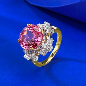 Luxurious S925 silver ring with a large pink sapphire lotus cut stone and gold finish