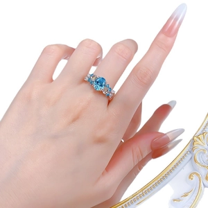 Luxurious S925 silver ring with 2ct oval blue zircon and hollow floral fairy details