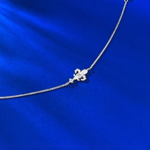 Elegant S925 sterling silver fleur-de-lis bracelet with sparkling zircon on blue silk
