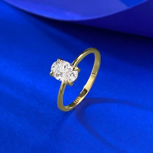 Macro view of S925 engraved mark and oval-cut gemstone on minimalist gold ring