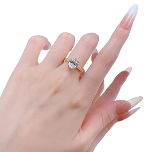 Classic gold S925 silver ring featuring an oval white diamond with pavé setting