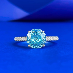 S925 sterling silver ring featuring octagonal light blue gemstone and pave diamond band