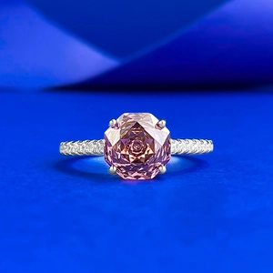 Luxurious S925 silver ring featuring an octagon rose-cut pink gemstone on blue backdrop