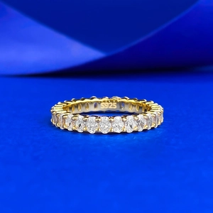 Elegant S925 sterling silver gold plated eternity ring with oval cut moissanite stones