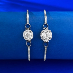Detail eines S925 Silber Moissanit Armbands mit rundem Hauptstein und Halo-Einfassung