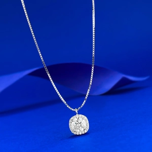 Detailed view of S925 silver halo pendant necklace with a round brilliant cut moissanite stone