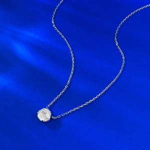 Detailed close-up of S925 silver necklace with 2.5 carat brilliant round cut pendant