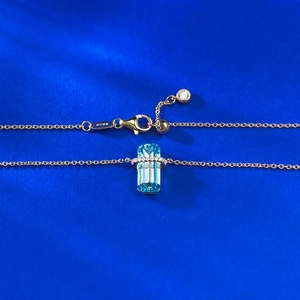 Elegant S925 silver necklace with rectangular blue topaz and sparkling gold chain detail