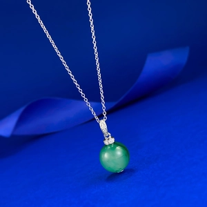 Detailed view of a 12mm green chalcedony bead pendant on an S925 silver necklace chain