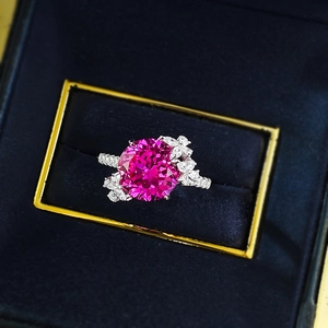 Elegant S925 silver ring featuring 10mm magenta lotus-cut gemstone with butterfly accent