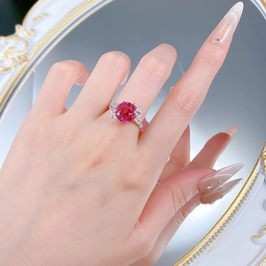 Detailed close-up of S925 silver ring with 10mm oval pink gemstone and butterfly accents