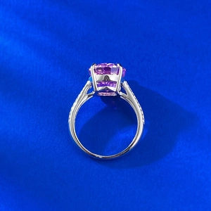 Detailed top view of S925 silver ring with oval pink stone and halo diamond accents