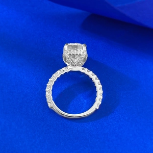Top view of 5 carat cushion cut ice flower high carbon diamond halo ring in 925 silver