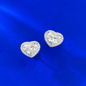 Elegant S925 sterling silver heart-shaped stud earrings with halo cubic zirconia setting