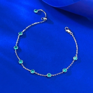 S925 sterling silver bubble bracelet with eight emerald green circular zircon gemstones