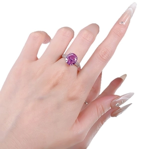 Luxurious S925 silver ring featuring a large purple round-cut gemstone with side diamonds