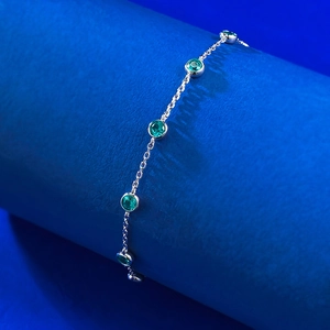 Elegant S925 silver bracelet with five bezel-set round green emerald zircons