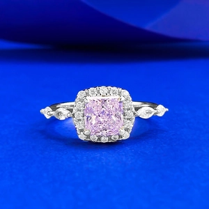 Princess cut pink gemstone ring with halo diamonds and leaf-shaped side stones in S925 silver