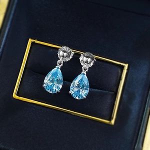 Elegant S925 sterling silver pear-cut blue gemstone drop earrings in luxury jewelry box