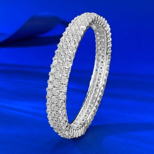 Luxurious silver-tone wide ring featuring three rows of sparkling micro-pave crystals