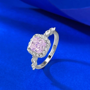 Close-up of S925 sterling silver ring featuring a square pink gemstone and side diamonds