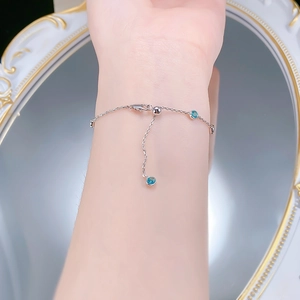 Detail of S925 silver bracelet featuring blue zircon stones and adjustable slide clasp