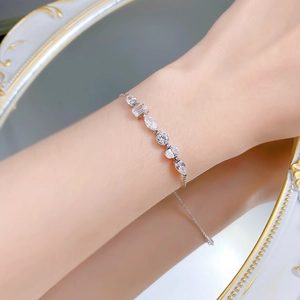 Macro view of S925 silver bracelet featuring multi-shape stones and adjustable clasp
