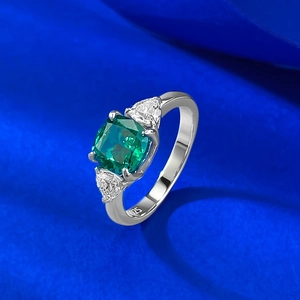 Classic S925 silver ring featuring a 2-carat cushion-cut green stone with side stones