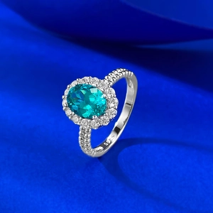 S925 sterling silver ring with 1.5ct oval paraiba blue stone and halo setting
