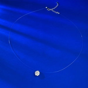 Minimalist invisible fishing line necklace with a sparkling solitaire zircon pendant
