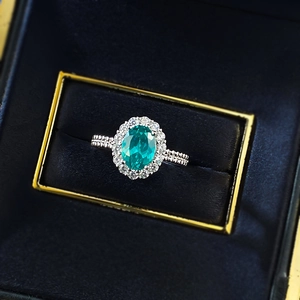 S925 silver ring with oval paraiba tourmaline gemstone and diamond halo in a gift box