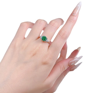S925 sterling silver ring with 2ct green cushion cut stone and triangle side diamonds