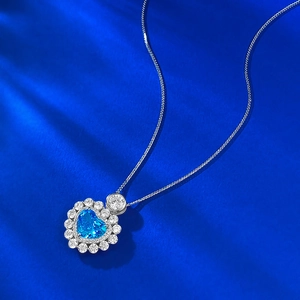 S925 silver necklace with heart-shaped aquamarine pendant and zircon halo on blue silk