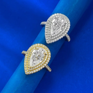 Elegant S925 silver and gold pear-cut halo rings with iced-out pave diamond bands