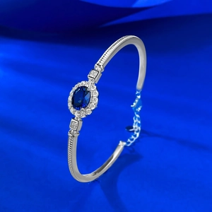 Elegant S925 silver open bracelet with royal blue sapphire and adjustable chain