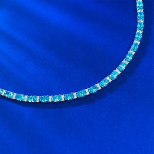Luxurious S925 silver tennis bracelet with 4x6 oval aquamarine blue stones and white diamonds