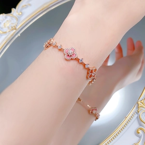 Elegant rose gold S925 silver four-leaf clover bracelet with pink petals and zircons