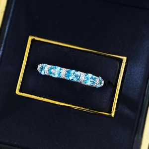 S925 silver ring featuring five oval-cut aquamarine stones in a luxury gift box