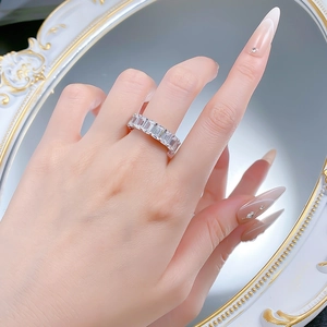 Elegantly hand-worn S925 silver eternity band with emerald-cut crystals for women