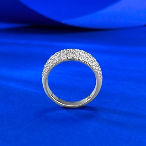 Macro detail of S925 sterling silver stamp and pave set sparkling zircons on ring band