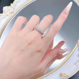 Elegant S925 silver multi-row sparkling diamond band ring worn on hand with mirror backdrop