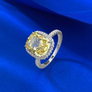 S925 sterling silver ring with cushion cut yellow ice flower diamond on blue silk background
