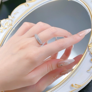 Detail of S925 sterling silver eternity band ring featuring sparkling pave cubic zirconia
